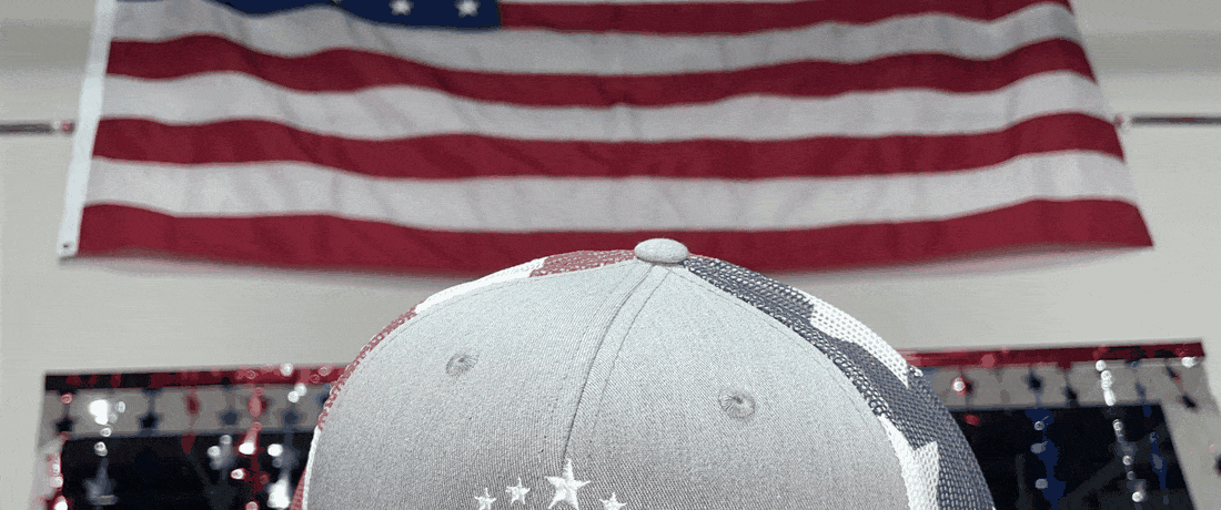 Custom 250 hats for America's 250th — flag, embroidery floor, and HatLaunch banner